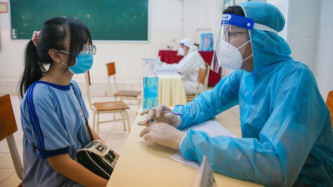 Vaccination progress against COVID-19 has to be accelerated in Ho Chi Minh City. (Photo courtesy of nld.com.vn)