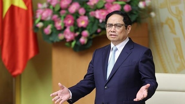 Prime Minister Pham Minh Chinh addresses the meeting (Photo: VNA)