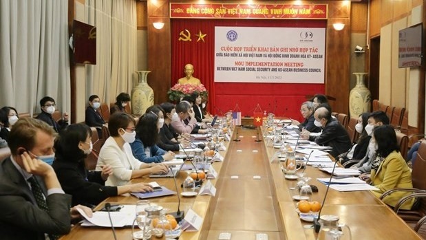 At the working session between the US-ASEAN Business Council and the Vietnam Social Security. (Photo: VNA)