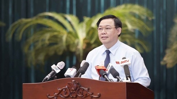 NA Chairman Vuong Dinh Hue addresses the conference in HCM City on March 21. (Photo: VNA)