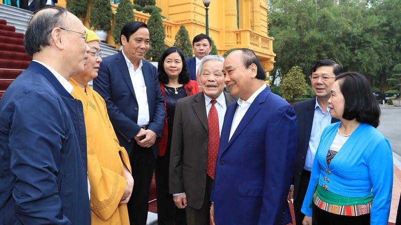 President Nguyen Xuan Phuc and delegates attending the conference (Photo: VNA)