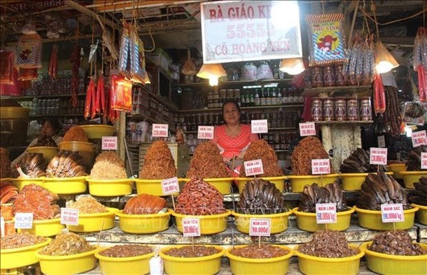 Typical varieties of fish sauce on sale at a market in An Giang. (Photo: VNA)