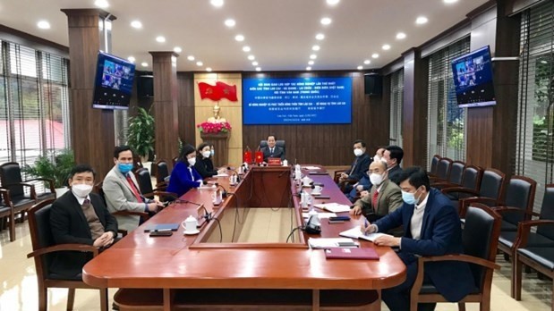 Lao Cai officials attend the meeting via videoconference. (Photo: nongnghiep.vn)