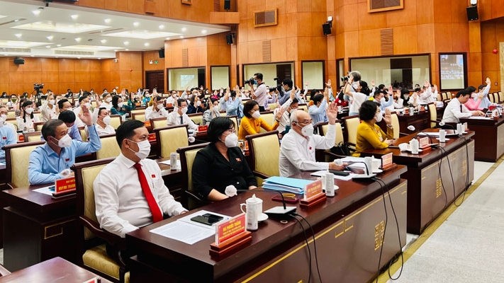 Delegates attend the working session on April 7