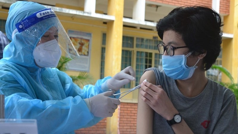 A person in Ho Chi Minh City is vaccinated against COVID-19.