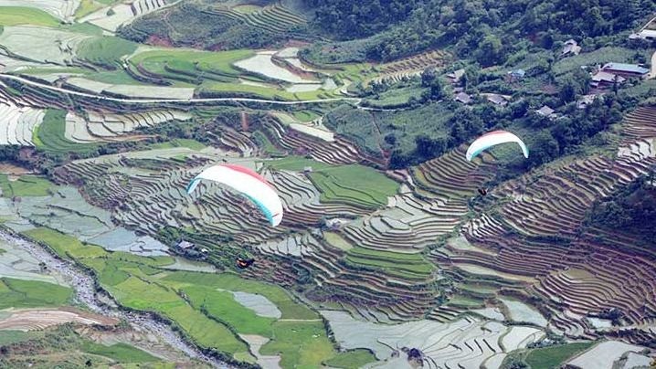 Paragliding festival will offer stunning aerial views of  terraced rice fields in Mu Cang Chai district, Yen Bai Province. (Photo: Duc Tuong)