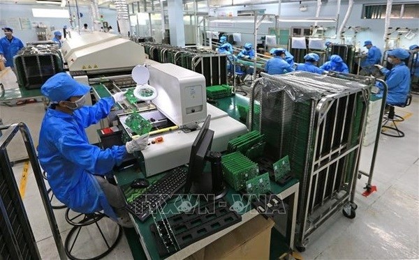 Electronic meter production (Photo: VNA)