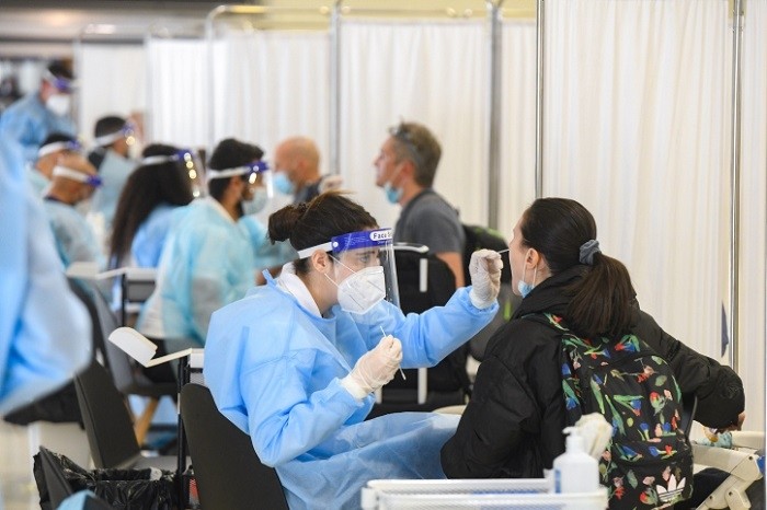 Israel said it was ending mandatory COVID-19 testing for arrivals at Tel Aviv's Ben Gurion airport, but foreigners would still have to test negative overseas before boarding a flight to the country.