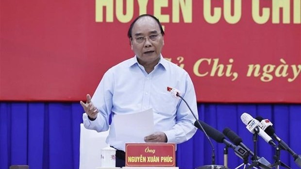 President Nguyen Xuan Phuc speaks at the meeting with voters of Cu Chi district, Ho Chi Minh City, on May 11. (Photo: VNA)