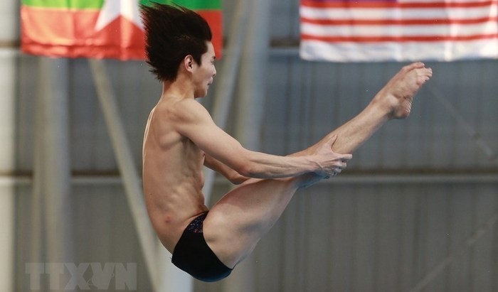 The competition of Vietnamese athlete Nguyen Tung Duong in men’s single 3m springboard diving. (Photo: VNA)