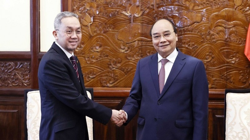 President Nguyen Xuan Phuc and outgoing Bruneian Ambassador Pengiran Haji Sahari bin Pengiran Haji Salleh. (Photo: VNA)