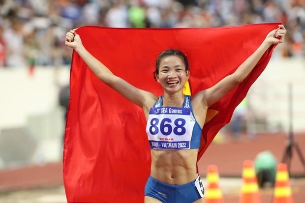 Vietnamese runner Nguyen Thi Oanh makes a gold hat-trick after two days of competition. (Photo: VNA)