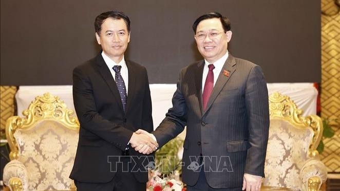 National Assembly Chairman Vuong Dinh Hue and Malaythong Kommasith, President of State Audit Organisation of Laos (Photo: VNA)