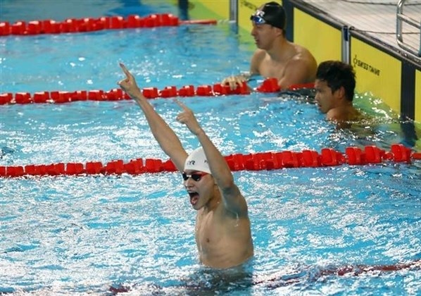Ben Tre-born swimmer Pham Thanh Bao wins a gold medal in the men's 50m breaststroke event (Photo: VNA) 