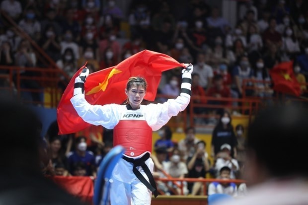 Tran Thi Anh Tuyet wins a gold medal in the women's under 53kg categogy (Photo: VNA)