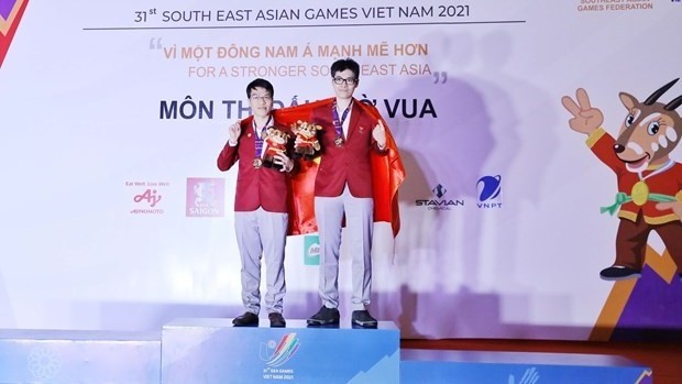 Le Quang Liem and Le Tuan Minh win one more gold medal for Vietnam in In the men’s team blitz chess event. (photo: VNA) 