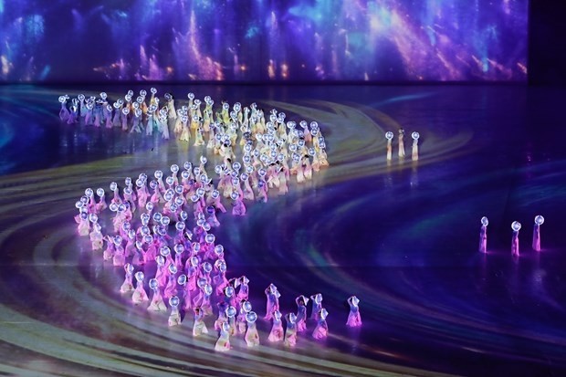 A colourful performance at the SEA Games 31's opening ceremony on May 12. (Photo: VNA)