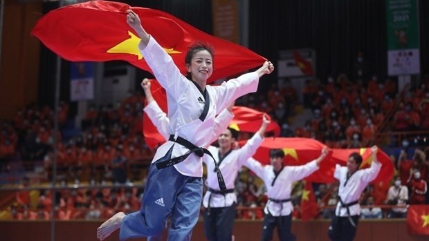The Taekwondo team of Vietnam won  four gold and one silver medals in the very first day of competition at SEA Games 31. (Photo: VNA)