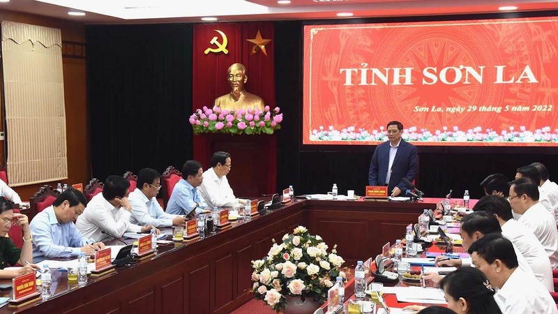 The working session between Prime Minister Pham Minh Chinh and Son La leaders. (Photo: Tran Hai)