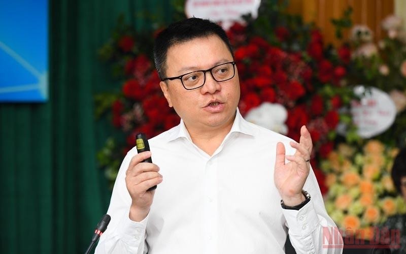 Member of the Party Central Committee (PCC), Editor-in-Chief of Nhan Dan (People) Newspaper, Deputy Head of the PCC Commission for Communication and Education, and Chairman of the Vietnam Journalists’ Association Le Quoc Minh speaks at the workshop. (Photo: NDO/Thanh Dat)