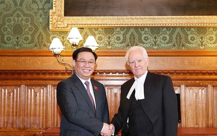 NA Chairman Vuong Dinh Hue and Speaker of the UK House of Lords John Francis McFall (Photo: VNA)