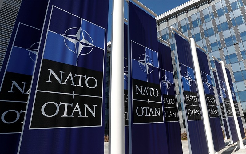 Banner with NATO logo at the entrance to NATO headquarters in Brussels, Belgium, April 19, 2018. (Photo: Reuters)