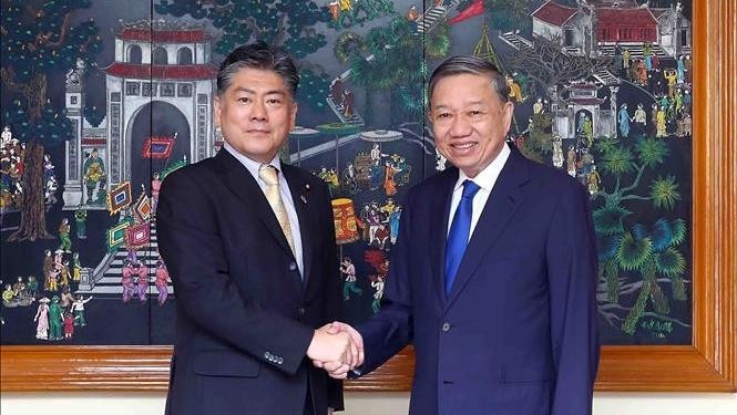 Minister of Public Security To Lam meets with Japanese Minister of Justice Furukawa Yoshihisa in Hanoi on June 30. (Photo: VNA)