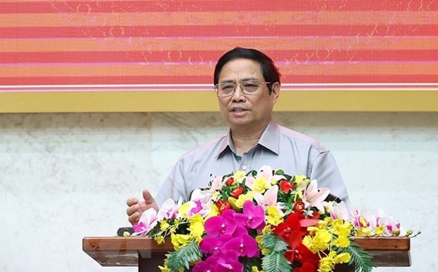 Prime Minister Pham Minh Chinh addresses the working session. (Photo: VNA)