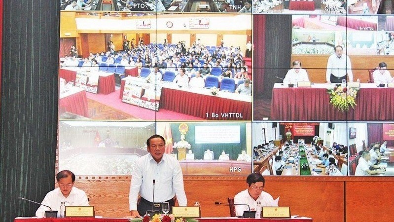 Minister Nguyen Van Hung chaired the conference (Photo: the VNAT)