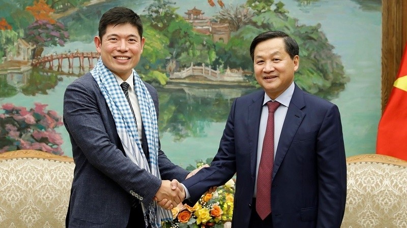 Deputy PM Le Minh Khai and Grab CEO Anthony Tan. (Photo: VGP)