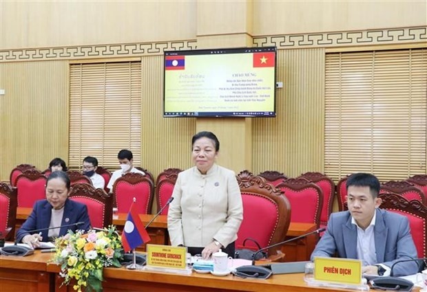 Vice Chairwoman of the Lao NA Sounthone Xayachack (middle) addressed the event (Photo: VNA)