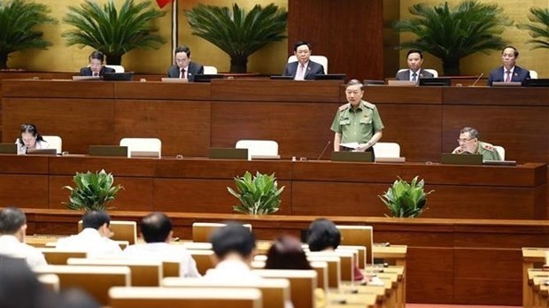 Minister of Public Security Gen. To Lam answers questions from lawmakers on August 10. (Photo: VNA)