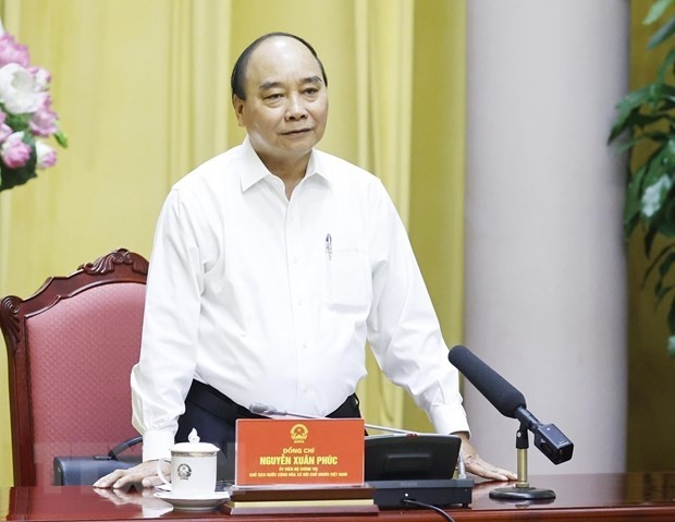 President Nguyen Xuan Phuc speaking at the meeting. (Photo: VNA)
