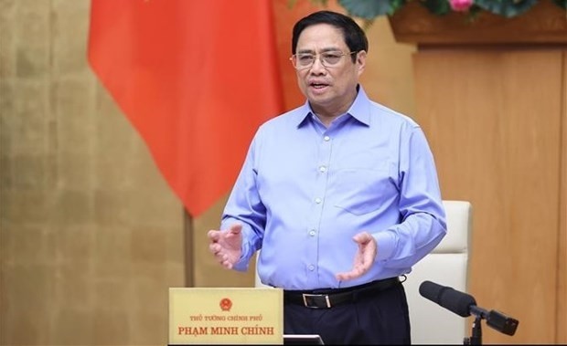 Prime Minister Pham Minh Chinh speaks at the Government meeting on August 24. (Photo: VNA)