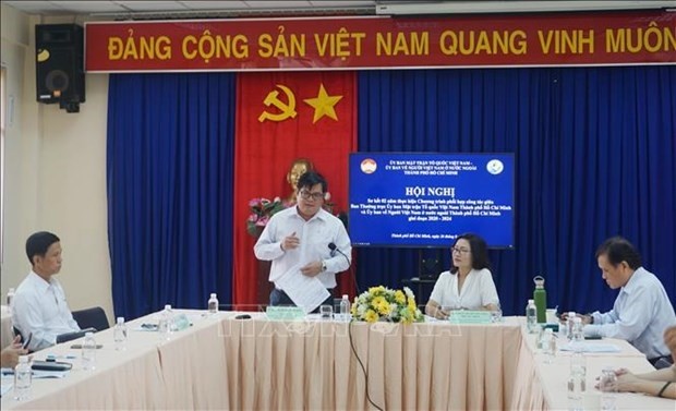 Vice Chairman of the VFF Committee of Ho Chi Minh City Ngo Thanh Son (standing) speaks at the conference on August 26. (Photo: VNA)