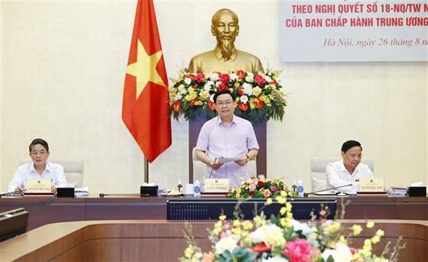 NA Chairman Vuong Dinh Hue speaks at the event. (Photo: VNA)