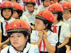 Promoting action on child helmet use