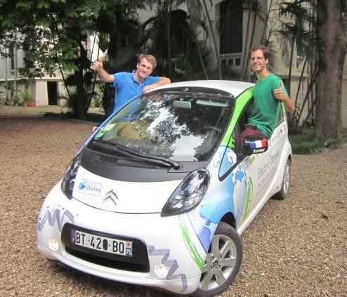Xavier Dedon and Antonin Guy with Citroen C-zero car in Hanoi
