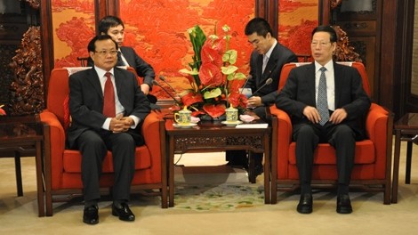 Vietnam Politburo member Pham Quang Nghi (left) and Chinese Vice Premier Zhang Gaoli (Credit: VNA)