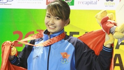 A gold medal smile at the 26th SEA Games in Indonesia 