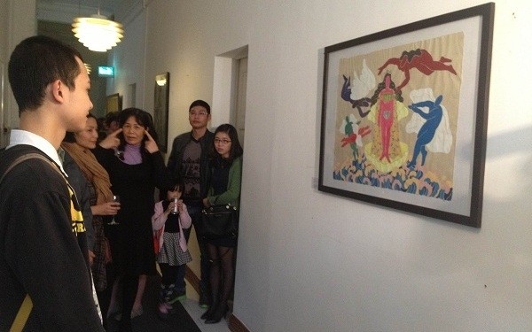 Visitors enjoy Vietnamese paintings at the Danish Embassy 