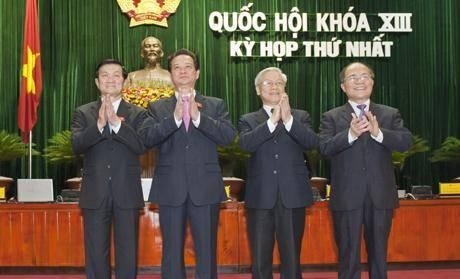 From left: President Truong Tan Sang, newly re-elected Prime Minister Nguyen Tan Dung, Party General Secretary Nguyen Ph