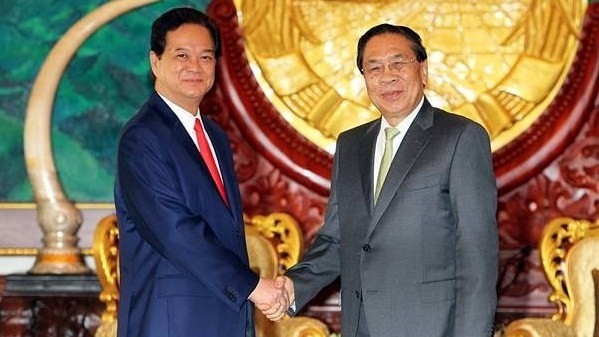 Prime Minister Nguyen Tan Dung and General Secretary of the Lao People’s Revolutionary Party  and President Choummaly Sayasone. (Credit: VNA)