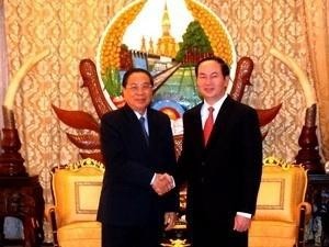 State President of Laos Chummaly Sayasone receives Vietnamese Minister of Public Security Lieut. Gen. Tran Dai Quang