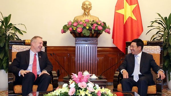 Deputy PM Pham Binh Minh and US Ambassador to Vietnam Ted Osius agree to work closely to organise activities celebrating the 20th anniversary of diplomatic ties this year. (Credit: VGP)