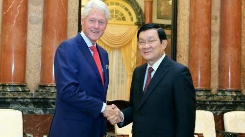 State President Truong Tan Sang receives former US President Bill Clinton in Hanoi on July 2.