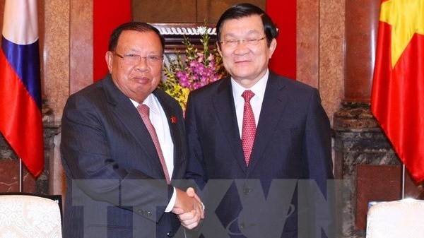 President Truong Tan Sang with Lao Vice President Bounnhang Vorachith (Credit: VNA)
