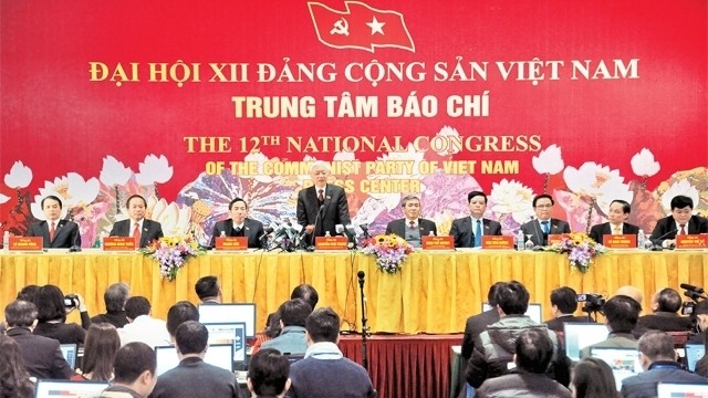 Party General Secretary Nguyen Phu Trong announces the result of the Congress at the press conference (photo: Tuan Hai)