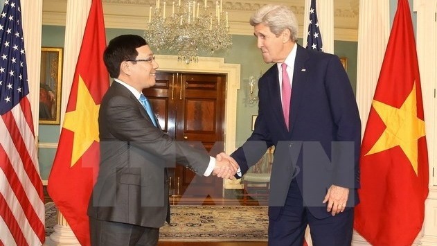 Deputy Prime Minister and Foreign Minister Pham Binh Minh (L) and US Secretary of State John Kerry (Source: VNA)