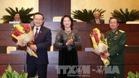 Do Ba Ty and Phung Quoc Hien have been elected Vice Chairmen of the 13th National Assembly. (Photo: VNA)
